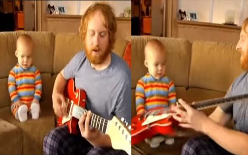 2歲寶寶聽爸爸彈吉他超投入，當吉他遞給他...下一秒網友全驚呆！