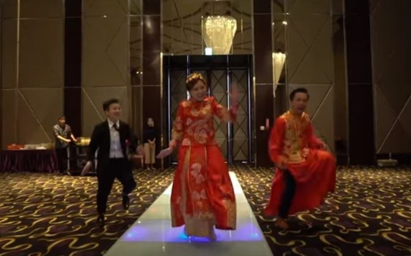 婚禮就要這樣玩！新人顛覆傳統穿龍鳳掛大跳「韓國洗腦舞」一鏡到底拍攝嗨翻全場
